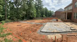 Completed multi-phase landscape design with stone patio in Greenville, SC