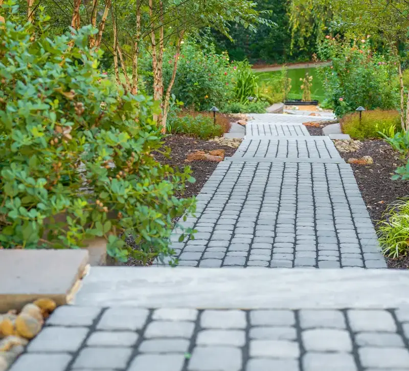 Stepped stone pathway with solar lanterns, hardscaping in Greenville, SC