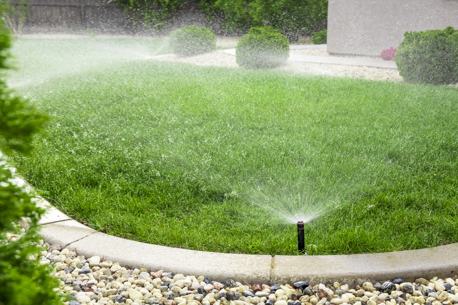 sprinkler-system-waters-green-lawn-in-suburban-yar-2026-09-23-07-07-00-utc